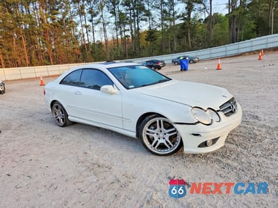 Czwarte zdjęcie samochodu z boku: 2007 MERCEDES-BENZ CLK 550 VIN:WDBTJ72H57F218852 - miniatura