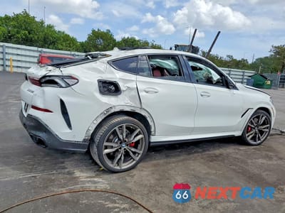 Trzecie zdjęcie samochodu z tyłu: 2021 BMW X6 M50I VIN:5UXCY8C02M9F23278 - miniatura