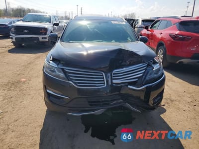 Piąte zdjęcie samochodu w środku: 2015 LINCOLN MKC VIN:5LMCJ2A9XFUJ47388 - miniatura
