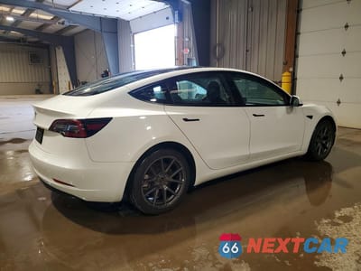 Trzecie zdjęcie samochodu z tyłu: 2022 TESLA MODEL 3 VIN:5YJ3E1EA4NF371547 - miniatura