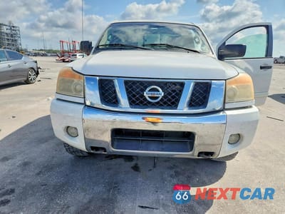 Piąte zdjęcie samochodu w środku: 2012 NISSAN TITAN SV VIN:1N6AA0CC5CN326498 - miniatura