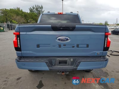 Zdjęcie 6 z 12 samochodu: 2023 FORD F150 LIGHTNING XLT VIN:1FTVW1EL6PWG12773 - miniatura