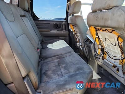 Zdjęcie 10 z 12 samochodu: 2009 HONDA RIDGELINE RT VIN:5FPYK16209B102142 - miniatura