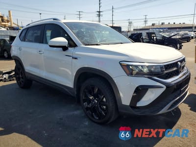 Czwarte zdjęcie samochodu z boku: 2022 VOLKSWAGEN TAOS SE VIN:3VVTX7B23NM078312 - miniatura