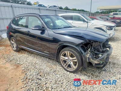 Czwarte zdjęcie samochodu z boku: 2014 BMW X1 SDRIVE28I VIN:WBAVM1C56EVW56525 - miniatura