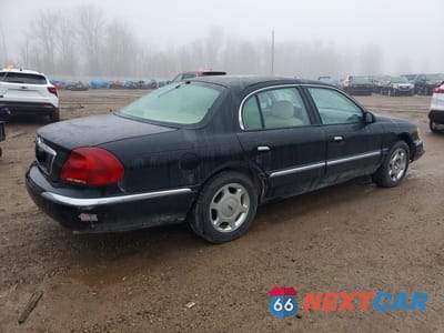 Trzecie zdjęcie samochodu z tyłu: 1999 LINCOLN CONTINENTAL VIN:1LNHM97V8XY705097 - miniatura