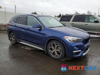 Czwarte zdjęcie samochodu z boku: 2018 BMW X1 XDRIVE28I VIN:WBXHT3C35J3H31675 - miniatura