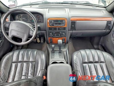 Zdjęcie 8 z 11 samochodu: 1999 JEEP GRAND CHEROKEE LIMITED VIN:1J4GW68S3XC615263 - miniatura