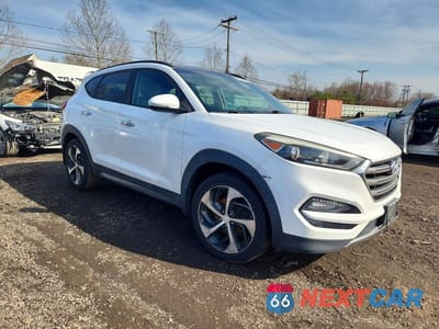 Czwarte zdjęcie samochodu z boku: 2016 HYUNDAI TUCSON LIMITED VIN:KM8J33A26GU183996 - miniatura