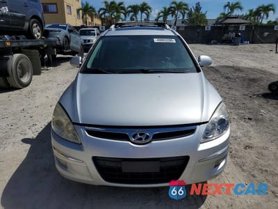 Piąte zdjęcie samochodu w środku: 2012 HYUNDAI ELANTRA TOURING SE VIN:KMHDC8AE2CU135118 - miniatura
