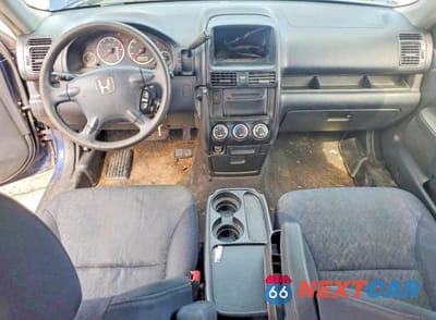 Zdjęcie 8 z 13 samochodu: 2005 HONDA CR-V LX VIN:JHLRD685X5C008856 - miniatura