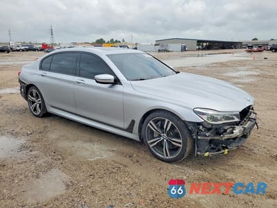 Czwarte zdjęcie samochodu z boku: 2017 BMW 750 I VIN:WBA7F0C33HGM21603 - miniatura