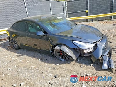 Czwarte zdjęcie samochodu z boku: 2021 TESLA MODEL 3 VIN:5YJ3E1EC8MF049493 - miniatura
