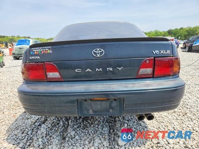 Zdjęcie 6 z 12 samochodu: 1994 TOYOTA CAMRY XLE V6 VIN:4T1GK13EXRU854176 - miniatura