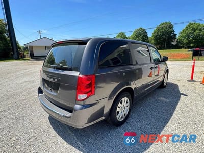 Czwarte zdjęcie samochodu z boku: 2016 DODGE GRAND CARAVAN SE VIN:2C4RDGBG5GR154900 - miniatura