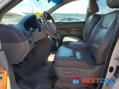Zdjęcie 7 z 13 samochodu: 2010 TOYOTA SIENNA XLE LIMITED VIN:5TDYK4CC3AS298956 - miniatura