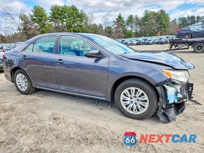 Czwarte zdjęcie samochodu z boku: 2014 TOYOTA CAMRY HYBRID LE VIN:4T1BD1FK1EU101782 - miniatura