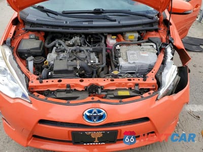 Zdjęcie 11 z 12 samochodu: 2014 TOYOTA PRIUS C TWO VIN:JTDKDTB35E1075090 - miniatura