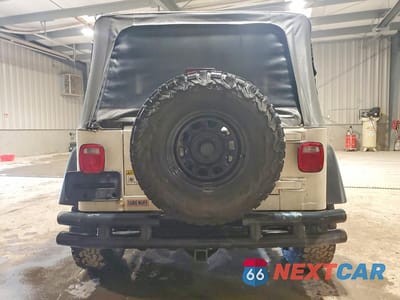 Zdjęcie 6 z 13 samochodu: 2003 JEEP WRANGLER COMMANDO VIN:1J4FA39S63P311192 - miniatura