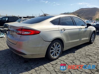 Trzecie zdjęcie samochodu z tyłu: 2017 FORD FUSION SE HYBRID VIN:3FA6P0LUXHR306838 - miniatura