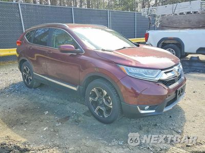 Czwarte zdjęcie samochodu z boku: 2017 HONDA CR-V TOURING VIN:2HKRW2H90HH632922 - miniatura