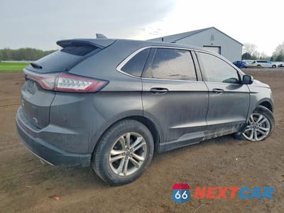 Trzecie zdjęcie samochodu z tyłu: 2017 FORD EDGE SEL VIN:2FMPK4J89HBB93744 - miniatura