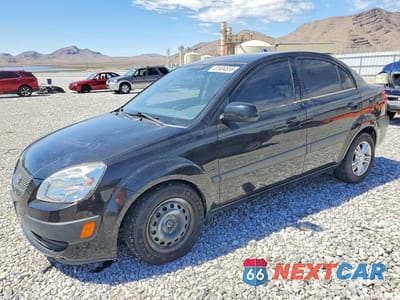 2009 KIA RIO BASE KNADE223696469459 - główne zdjęcie licytacji z USA - miniatura