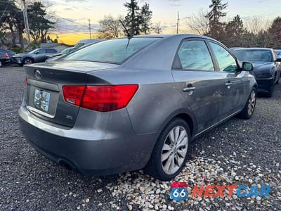 Czwarte zdjęcie samochodu z boku: 2011 KIA FORTE SX VIN:KNAFW4A30B5334170 - miniatura