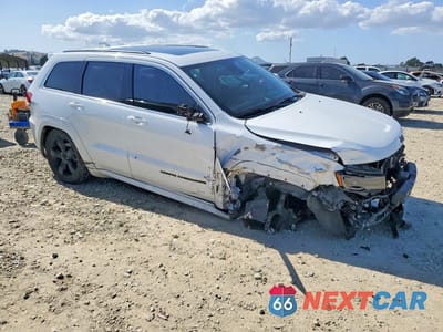 Czwarte zdjęcie samochodu z boku: 2016 JEEP GRAND CHEROKEE OVERLAND VIN:1C4RJFCG4GC406467 - miniatura