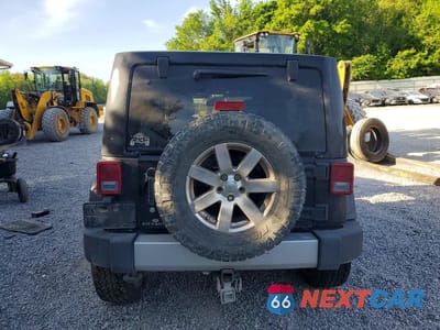 Zdjęcie 6 z 13 samochodu: 2013 JEEP WRANGLER UNLIMITED SAHARA VIN:1C4HJWEGXDL588521 - miniatura