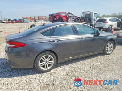 Trzecie zdjęcie samochodu z tyłu: 2018 FORD FUSION SE VIN:3FA6P0HD8JR160647 - miniatura