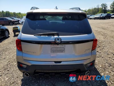 Zdjęcie 6 z 12 samochodu: 2022 HONDA PASSPORT ELITE VIN:5FNYF8H0XNB011021 - miniatura