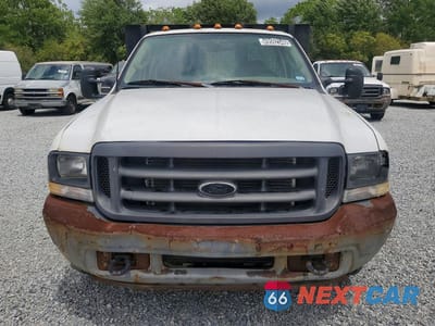 Piąte zdjęcie samochodu w środku: 2003 FORD F350 SUPER DUTY VIN:1FDWF36L73ED73695 - miniatura