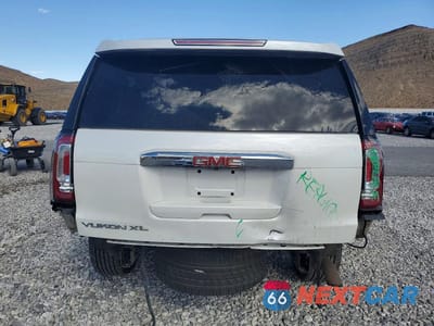 Zdjęcie 6 z 14 samochodu: 2017 GMC YUKON XL DENALI VIN:1GKS2HKJ0HR249613 - miniatura