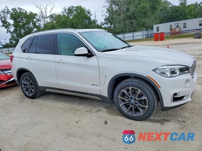 Czwarte zdjęcie samochodu z boku: 2017 BMW X5 XDRIVE35I VIN:5UXKR0C31H0X83229 - miniatura