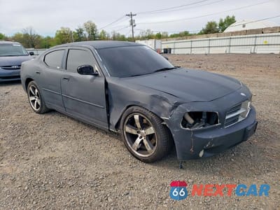 Czwarte zdjęcie samochodu z boku: 2006 DODGE CHARGER R VIN:2B3KA53H06H507703 - miniatura