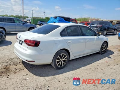 Trzecie zdjęcie samochodu z tyłu: 2018 VOLKSWAGEN JETTA SE VIN:3VWDB7AJ8JM261707 - miniatura