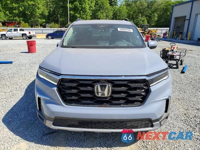 Piąte zdjęcie samochodu w środku: 2025 HONDA PILOT ELITE VIN:5FNYG1H85SB165772 - miniatura