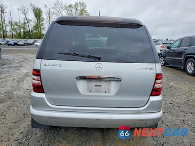 Zdjęcie 6 z 13 samochodu: 2000 MERCEDES-BENZ ML 430 VIN:4JGAB72E3YA208889 - miniatura