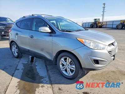 Czwarte zdjęcie samochodu z boku: 2012 HYUNDAI TUCSON GLS VIN:KM8JUCAC3CU470566 - miniatura