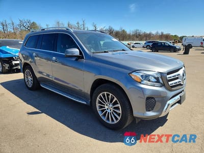 Czwarte zdjęcie samochodu z boku: 2017 MERCEDES-BENZ GLS 450 4MATIC VIN:4JGDF6EE7HA875231 - miniatura
