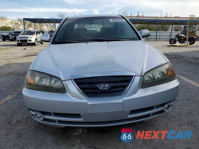 Piąte zdjęcie samochodu w środku: 2004 HYUNDAI ELANTRA GLS VIN:KMHDN46D84U788458 - miniatura