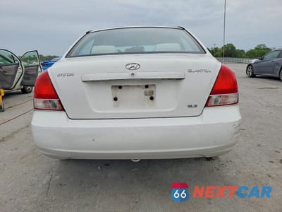 Zdjęcie 6 z 12 samochodu: 2001 HYUNDAI ELANTRA GLS VIN:KMHDN45D51U235215 - miniatura