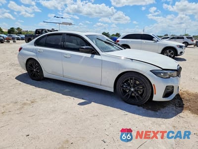 Czwarte zdjęcie samochodu z boku: 2022 BMW 330I VIN:3MW5R1J09N8C34258 - miniatura
