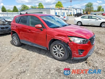 Czwarte zdjęcie samochodu z boku: 2016 MAZDA CX-5 TOURING VIN:JM3KE2CY4G0912414 - miniatura
