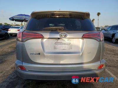Zdjęcie 6 z 13 samochodu: 2018 TOYOTA RAV4 LE VIN:JTMZFREV1JJ197481 - miniatura