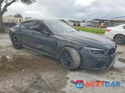 Czwarte zdjęcie samochodu z boku: 2022 BMW M8 VIN:WBSGV0C03NCH18297 - miniatura