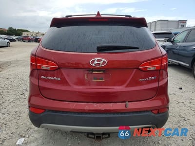 Zdjęcie 6 z 14 samochodu: 2013 HYUNDAI SANTA FE SPORT 2.0T VIN:5XYZU3LA0DG042816 - miniatura