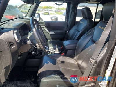 Zdjęcie 7 z 12 samochodu: 2015 JEEP WRANGLER UNLIMITED SAHARA VIN:1C4HJWEG3FL552656 - miniatura