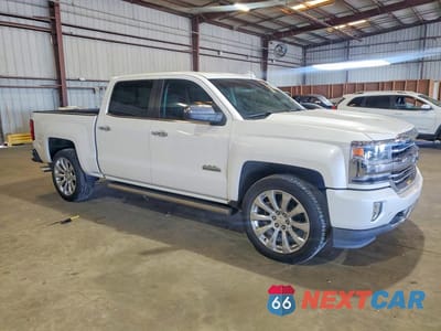Czwarte zdjęcie samochodu z boku: 2017 CHEVROLET SILVERADO K1500 HIGH COUNTRY VIN:3GCUKTEJ9HG407028 - miniatura